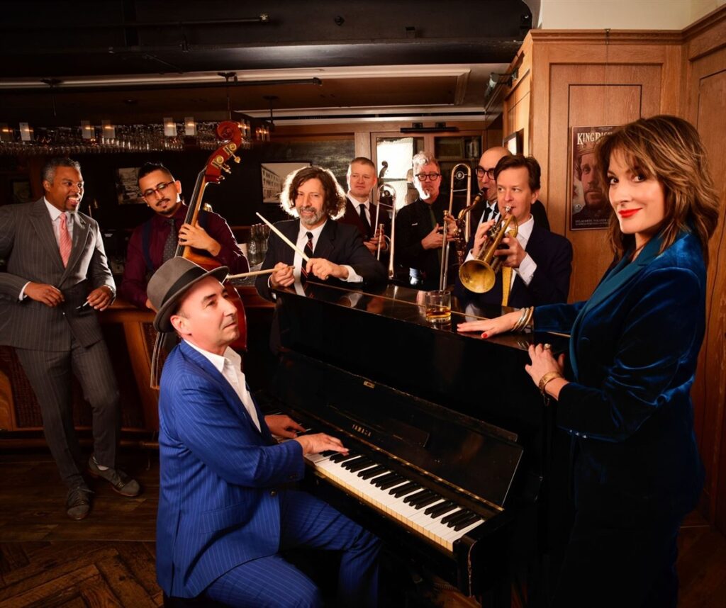 The Hot Sardines jazz band performing live, featuring vintage 1930s and '40s jazz sounds, at Pinecrest Gardens on November 2, 2024.